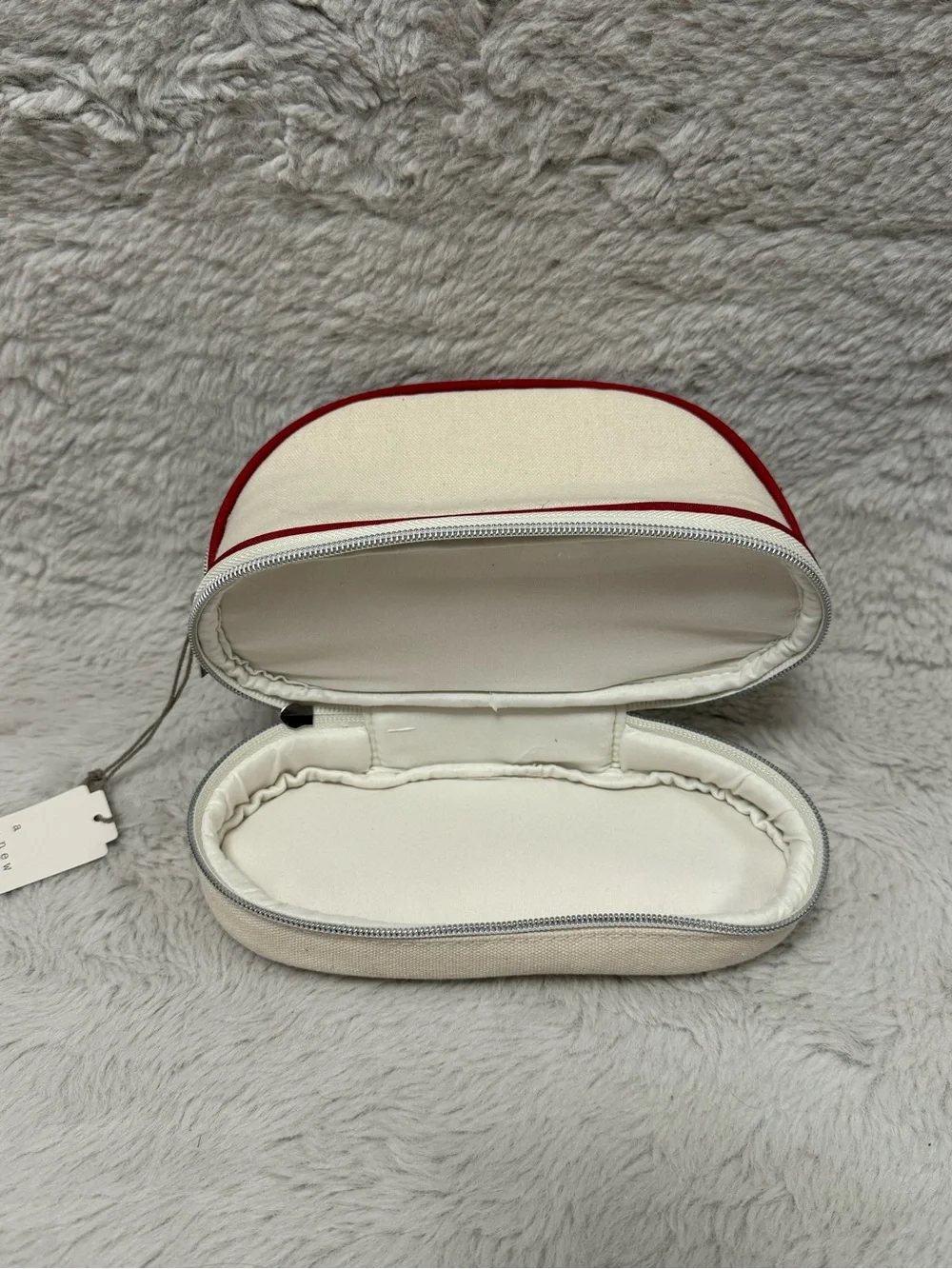 a new day Cream Cosmetic Pouch with Red Trim